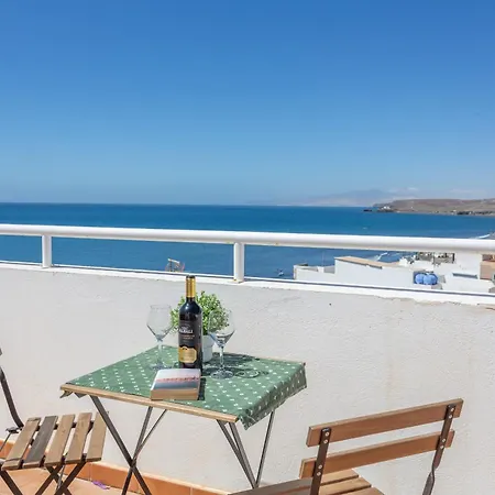 A Orillas De La Playa De *